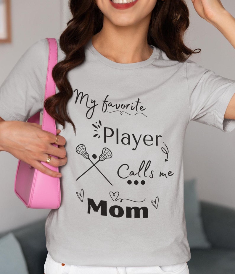 Lacrosse (LAX) Mom Tee, My Favorite Player Calls Me Mom T-Shirt, Women's Sports Shirt, Mom Gift Shirt, Cute Mom TeeLacrosse (LAX) Mom Tee, My Favorite Player Calls Me Mom T-Shirt, Women's Sports Shirt, Mom Gift Shirt, Cute Mom Tee