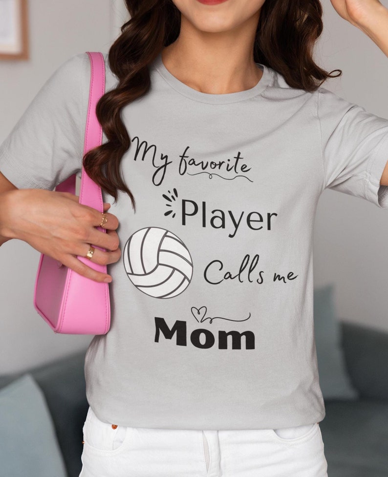 Volleyball Mom Tee, My Favorite Player Calls Me Mom T-Shirt, Women's Sports Shirt, softball Heart Design, Mom Gift Shirt, Cute Mom TeeVolleyball Mom Tee, My Favorite Player Calls Me Mom T-Shirt, Women's Sports Shirt, softball Heart Design, Mom Gift Shirt, Cute Mom Tee For Men And Women