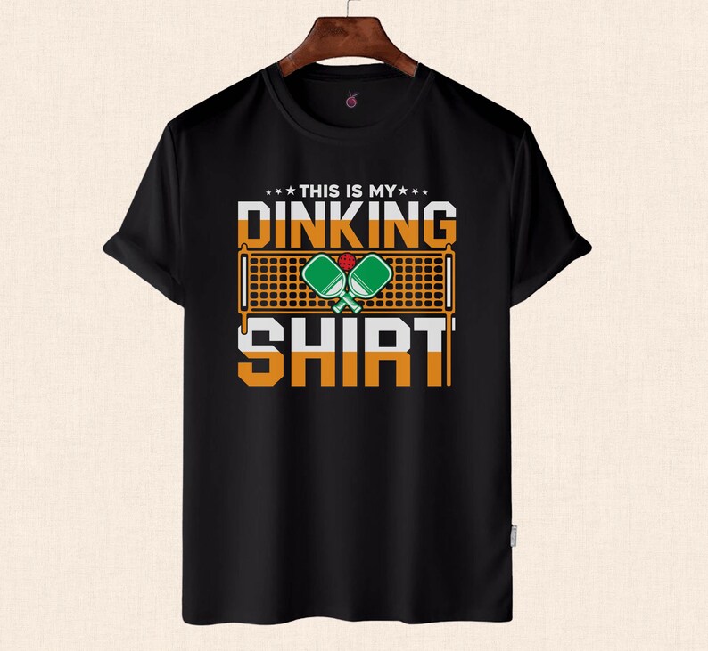 This is my Dinking Shirt, Pickleball Shirt, Gift for Pickleball Lover, Funny Pickleball Shirt, Pickleball Graphic TeeThis is my Dinking Shirt, Pickleball Shirt, Gift for Pickleball Lover, Funny Pickleball Shirt, Pickleball Graphic Tee For Men And Women