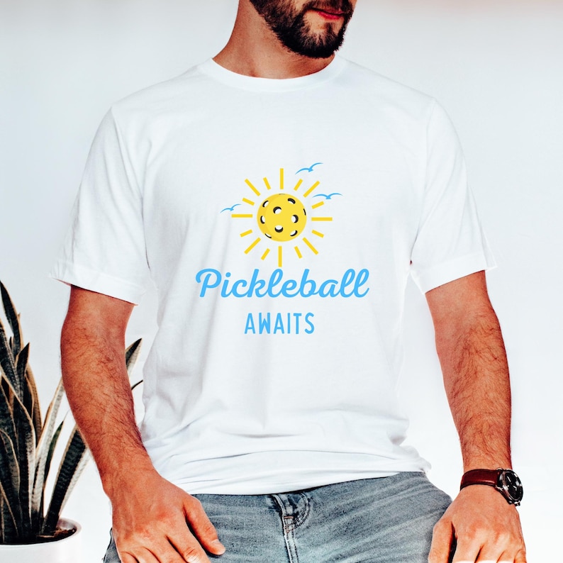 Pickleball Awaits Shirt, Women's Pickleball Shirt, Pickle Ball Mom Sportswear, Game Day Shirt, Sport Shirt, Workout Clothes With Neck LabelPickleball Awaits Shirt, Women's Pickleball Shirt, Pickle Ball Mom Sportswear, Game Day Shirt, Sport Shirt, Workout Clothes With Neck Label For Men And Women