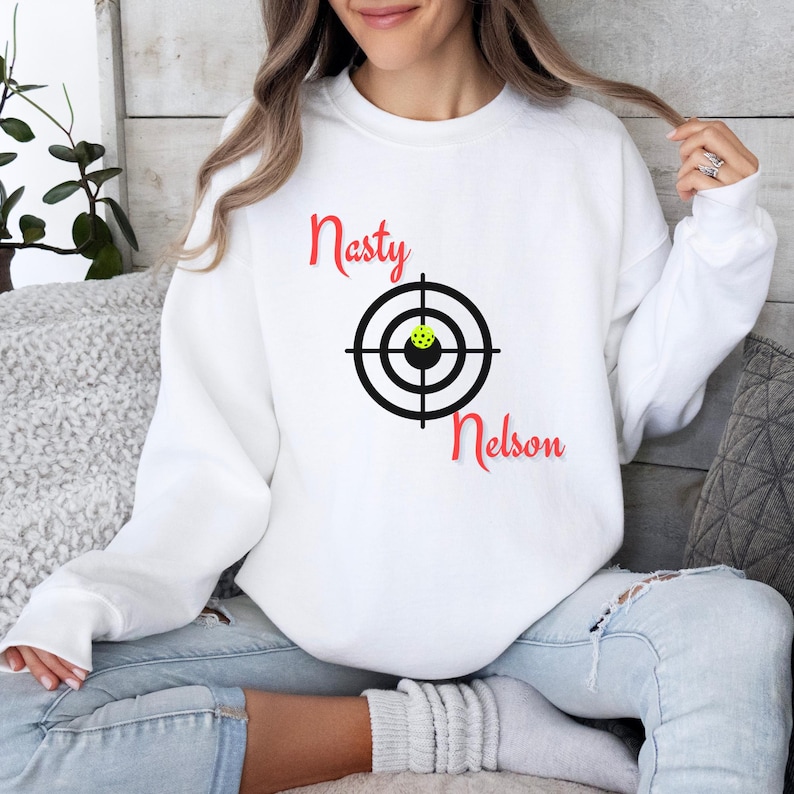 Nasty Nelson Target Pickleball Sweatshirt, Pickle Ball Sports Sweater, Trendy Crewneck Sweatshirts, Game Day Fall Sweater With Neck LabelNasty Nelson Target Pickleball Sweatshirt, Pickle Ball Sports Sweater, Trendy Crewneck Sweatshirts, Game Day Fall Sweater With Neck Label For Men And Women