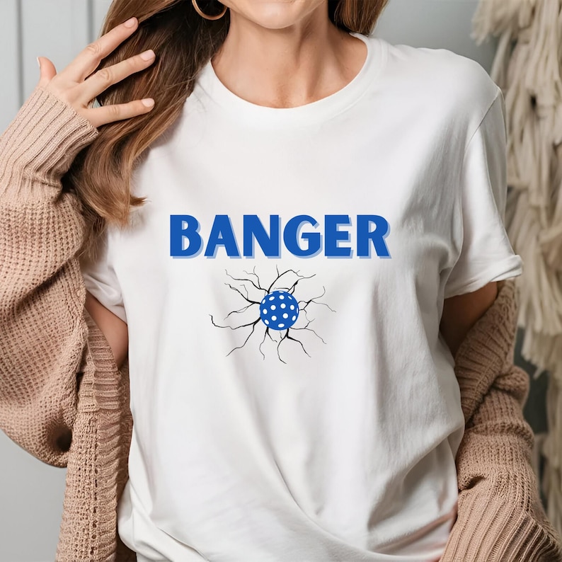 Banger Pickleball Shirt, Pickleball Tshirt, Pickle Ball T-Shirt, Funny Pickleball Tees, Gameday Shirt, Sport Shirt with Neck LabelBanger Pickleball Shirt, Pickleball Tshirt, Pickle Ball T-Shirt, Funny Pickleball Tees, Gameday Shirt, Sport Shirt with Neck Label