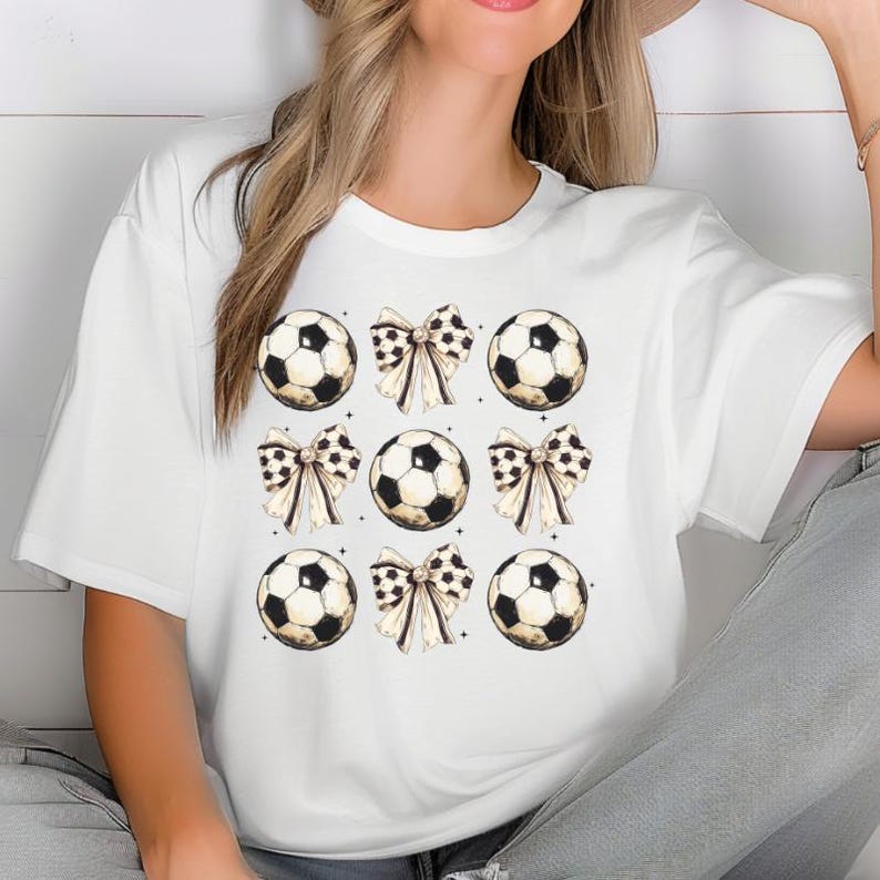 Coquette Soccer Bow Shirt, Soccer Mom Shirt, Mama Soccer Shirt, Soccer Fan Shirt, Coquette Gift Shirt, Soccer Game Day Shirt.Coquette Soccer Bow Shirt, Soccer Mom Shirt, Mama Soccer Shirt, Soccer Fan Shirt, Coquette Gift Shirt, Soccer Game Day Shirt.