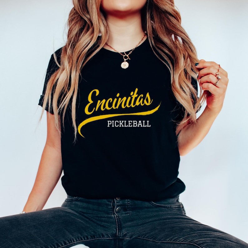 Encinitas Pickleball T Shirt, Pickleball Shirts, Womens Pickle Ball T-Shirt, Pickle Ball Workout Clothes, Sport Shirt Men With Neck LabelEncinitas Pickleball T Shirt, Pickleball Shirts, Womens Pickle Ball T-Shirt, Pickle Ball Workout Clothes, Sport Shirt Men With Neck Label