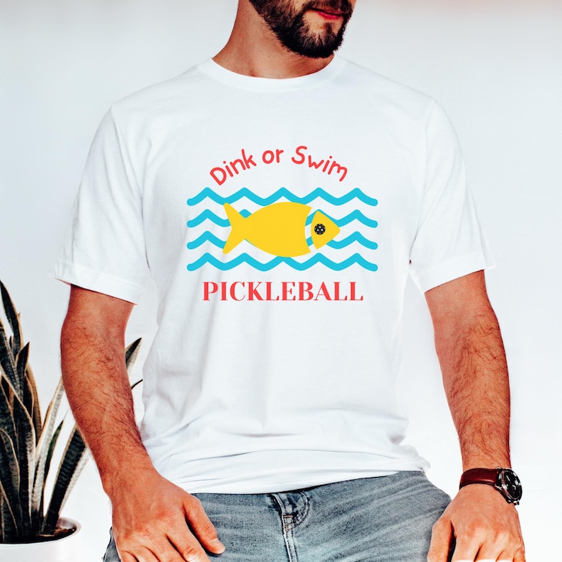 Dink or Swim T-Shirt, Pickleball Shirt, Funny Pickleball Shirts, Fish Shirt, Gameday Tshirt, Pickle Ball Shirt With Neck LabelDink or Swim T-Shirt, Pickleball Shirt, Funny Pickleball Shirts, Fish Shirt, Gameday Tshirt, Pickle Ball Shirt With Neck Label