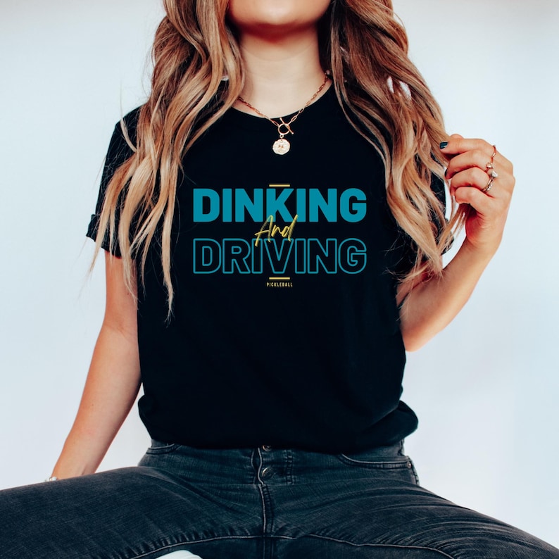 Dinking and Driving T-shirt, Pickle Ball T Shirt, Dink Tee Shirt, Pickleball Shirts, Sport Tees, Game Day Tee With Neck LabelDinking and Driving T-shirt, Pickle Ball T Shirt, Dink Tee Shirt, Pickleball Shirts, Sport Tees, Game Day Tee With Neck Label
