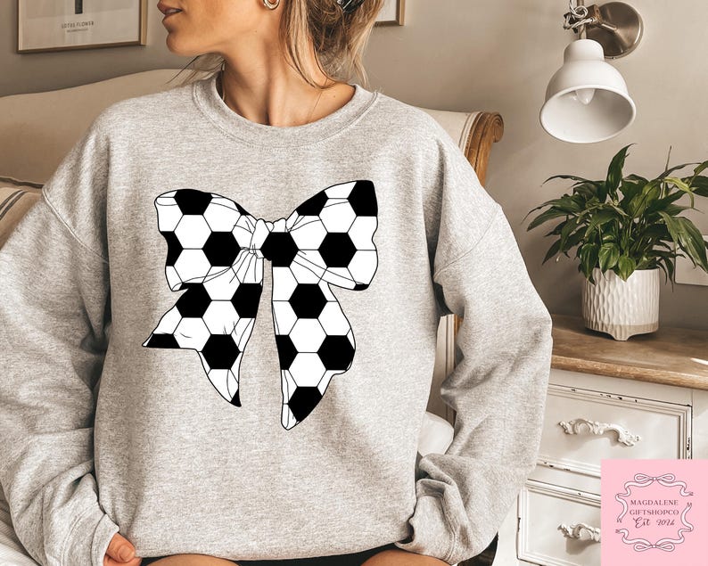 Coquette Soccer Shirt, Soccer Bow Sweatshirt, Soccer Mom Hoodie, Game Day Outfit, Aesthetic Game Day T-Shirt, Cute Sports Mom ApparelCoquette Soccer Shirt, Soccer Bow Sweatshirt, Soccer Mom Hoodie, Game Day Outfit, Aesthetic Game Day T-Shirt, Cute Sports Mom Apparel
