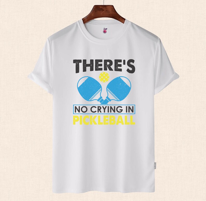 There's No Crying in Pickleball Shirt, Pickleball Shirt, Gift for Pickleball Lover, Funny Pickleball Shirt, Pickleball Graphic TeeThere's No Crying in Pickleball Shirt, Pickleball Shirt, Gift for Pickleball Lover, Funny Pickleball Shirt, Pickleball Graphic Tee For Men And Women